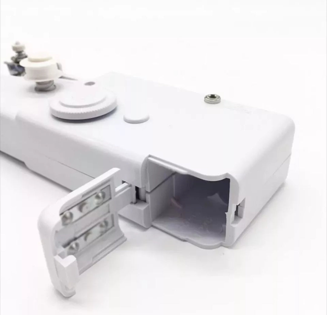 Máquina de coser portátil a pilas