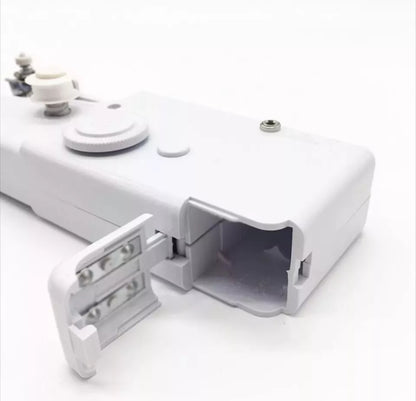 Máquina de coser portátil a pilas